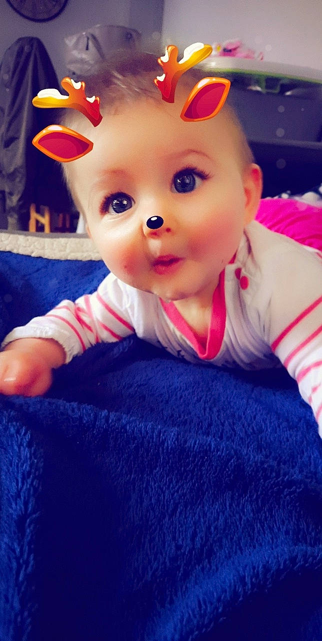 Halyna participe au concours pour gagner de l'argent avec cette photo : baby, baby_toddler_clothing, child, dress, electric_blue, finger, floor, flooring, fun, happy, hat, magenta, person, pink, selfie, sitting, skin, sleeve, t_shirt, toddler