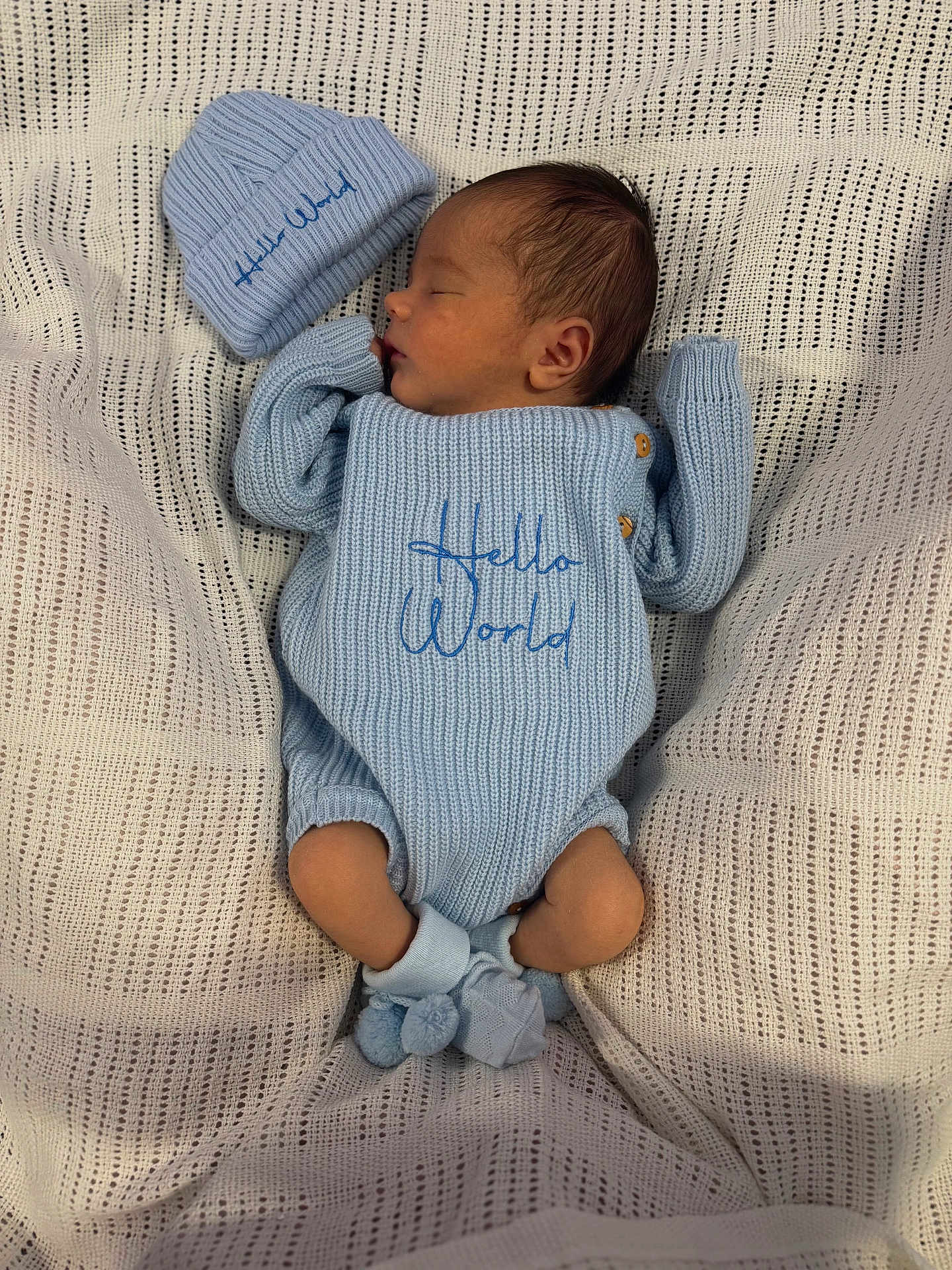 Amari-Alexander is registered to the contest to win money with this photo: newborn, baby, sleeping, blue_outfit, knitted_hat, knitted_blanket, cozy, infant, portrait, cute, peaceful, soft_texture, human, child, small, resting, indoors, warm, baby_clothes, sleep