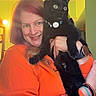 Pepsi Gerald joined the competition — help win amazing prizes! black_cat, bracelets, cat, collar, cute, green_wall, happy, holding, home, indoor, light_bulb, long_hair, mirror, orange_sweatshirt, person, pet, portrait, smiling, watch, yellow_wall