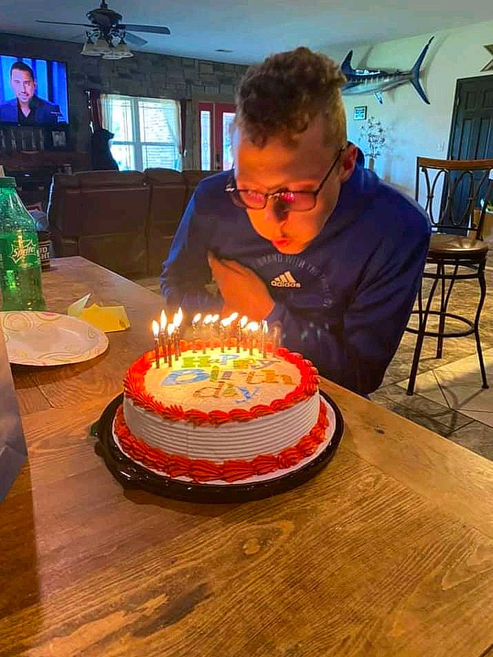 Nickolas is registered to the contest to win money with this photo: baked_goods, birthday, birthday_cake, birthday_candle, cake, cake_decorating, cake_decorating_supply, candle, chair, cuisine, dessert, dish, food, furniture, ingredient, person, plate, sharing, sugar_cake, table