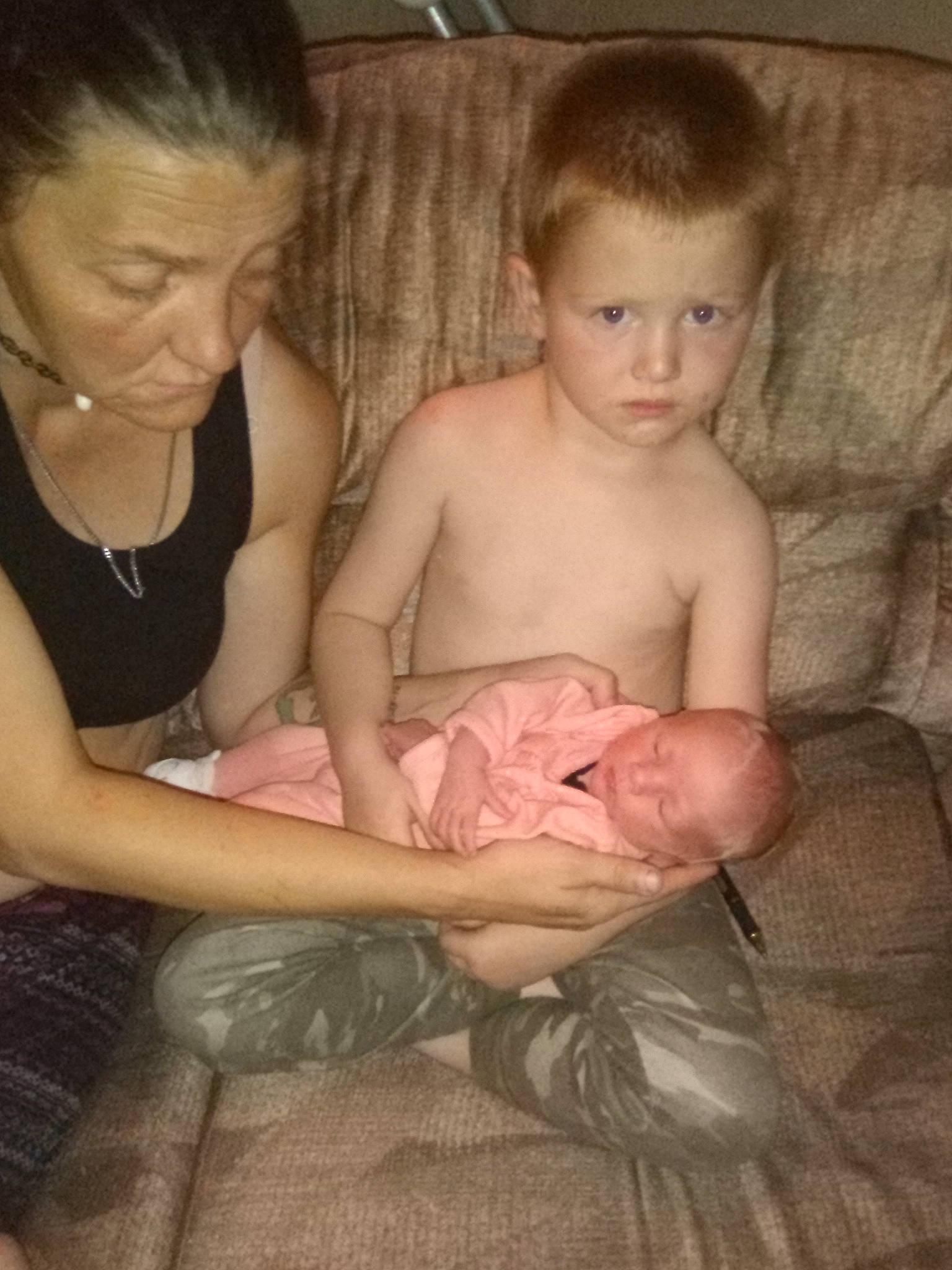 Levi is registered to the contest to win money with this photo: arm, baby, cheek, chest, comfort, finger, hair, hand, human_body, interaction, iris, joint, mammal, mouth, muscle, neck, person, skin, stomach, toddler