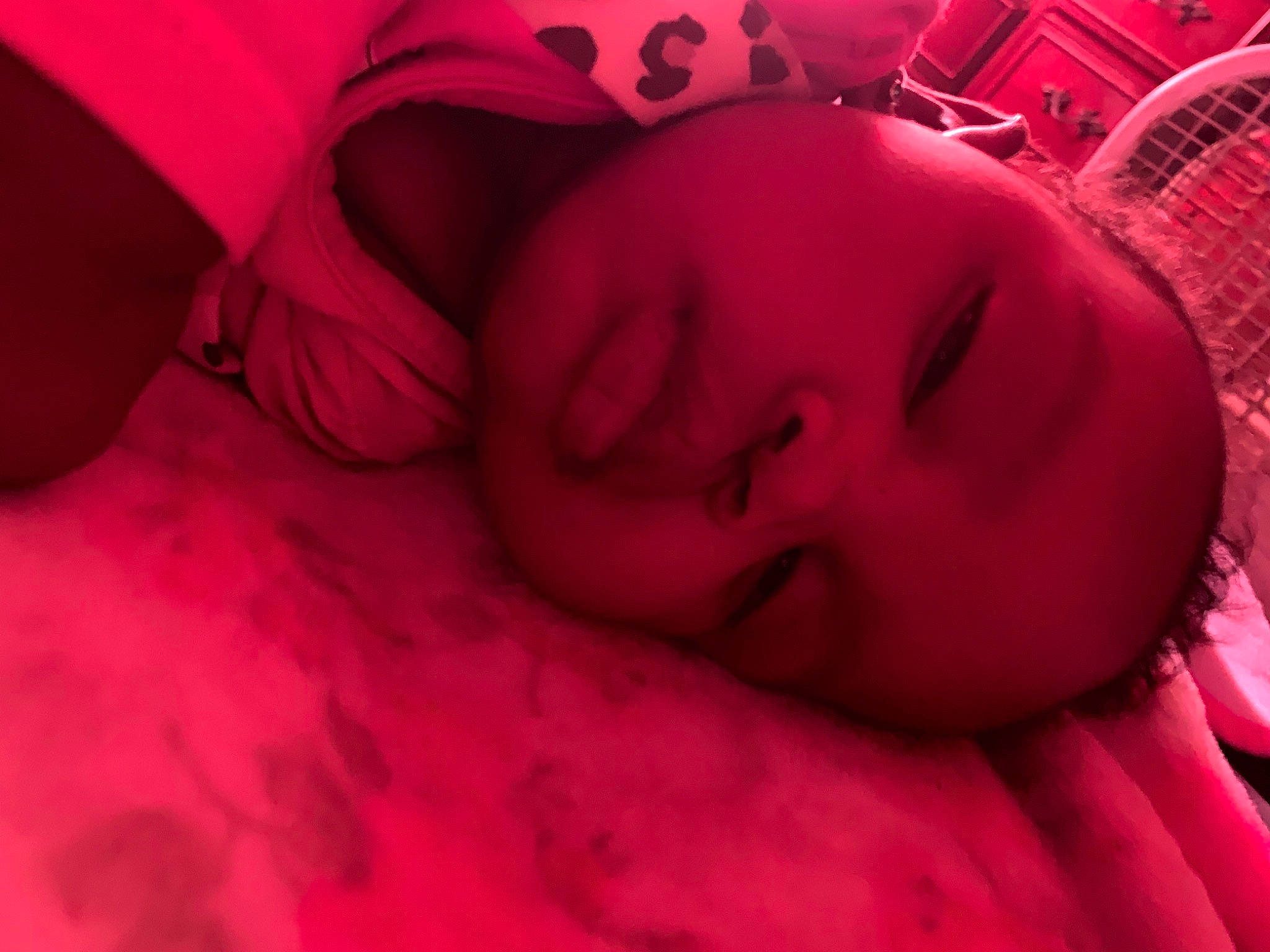 Ariyah is registered to the contest to win money with this photo: baby, cheek, chin, comfort, eye, eyebrow, eyelash, hair, hand, human_body, iris, lip, mouth, nose, person, pink, purple, skin, textile, toddler