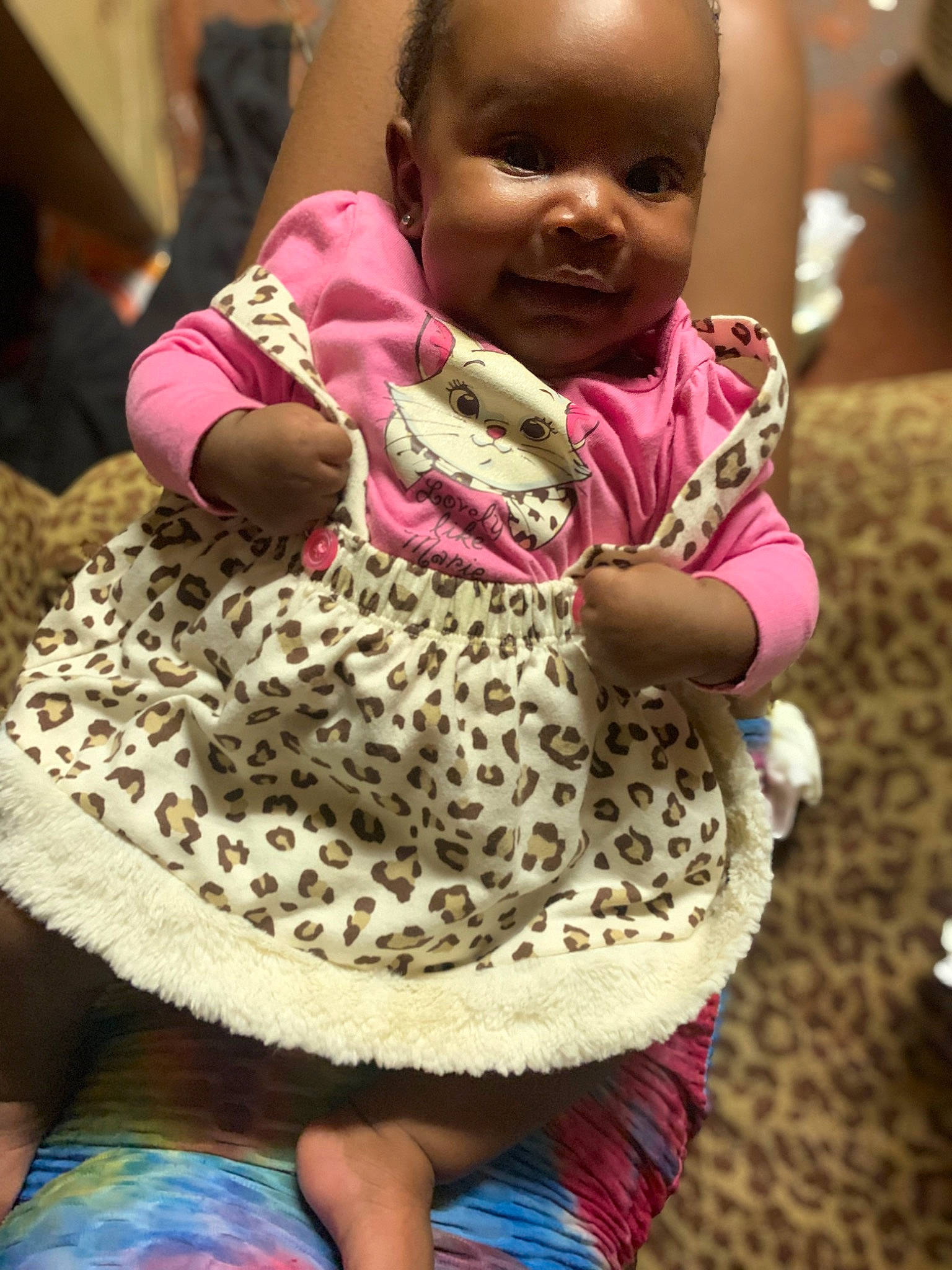 Ariyah joined the competition — help win amazing prizes! baby, baby_toddler_clothing, cheek, child, face, fun, happy, head, magenta, pattern, person, pink, purple, skin, sleeve, smile, textile, toddler, wool, woolen