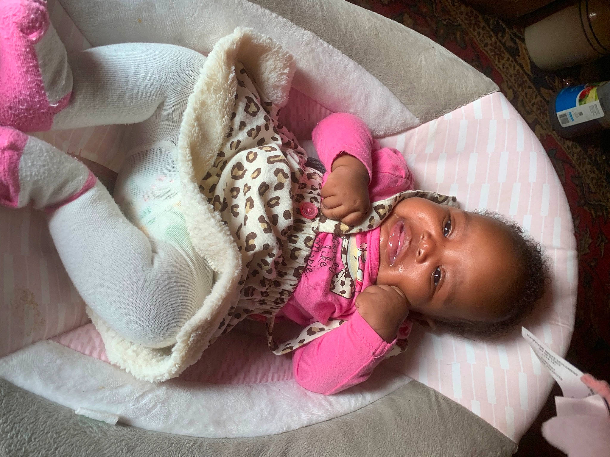 Ariyah joined the competition — help win amazing prizes! abdomen, baby, baby_products, baby_sleeping, baby_toddler_clothing, bedtime, child, comfort, happy, human_body, leg, linens, magenta, person, pink, room, skin, textile, thigh, toddler