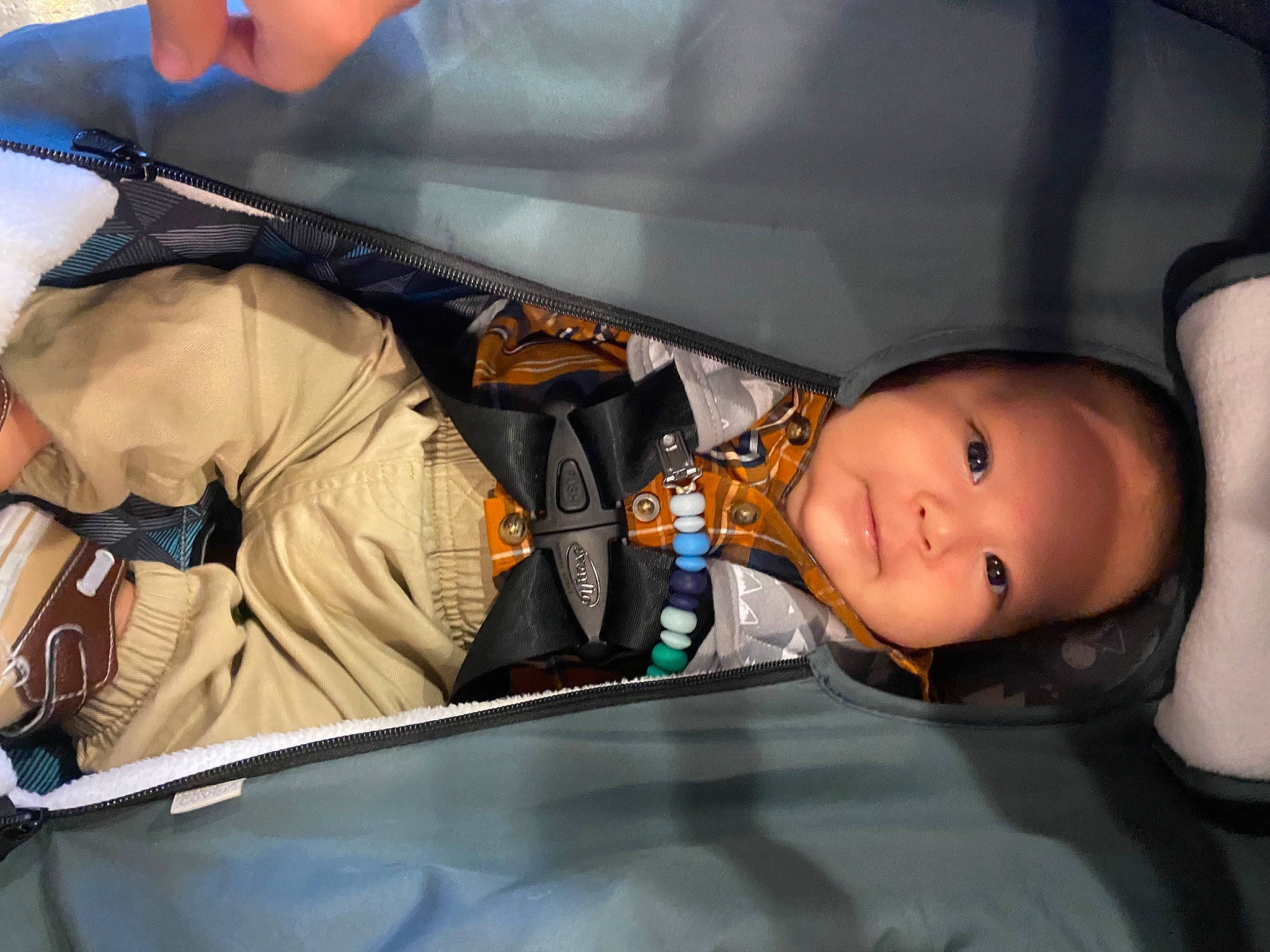 Grayson is registered to the contest to win money with this photo: auto_part, automotive_design, automotive_exterior, automotive_window_part, baby, baby_carriage, baby_products, bag, bumper, car_seat, child, comfort, family_car, headwear, hood, luxury_vehicle, motor_vehicle, person, sitting, toddler