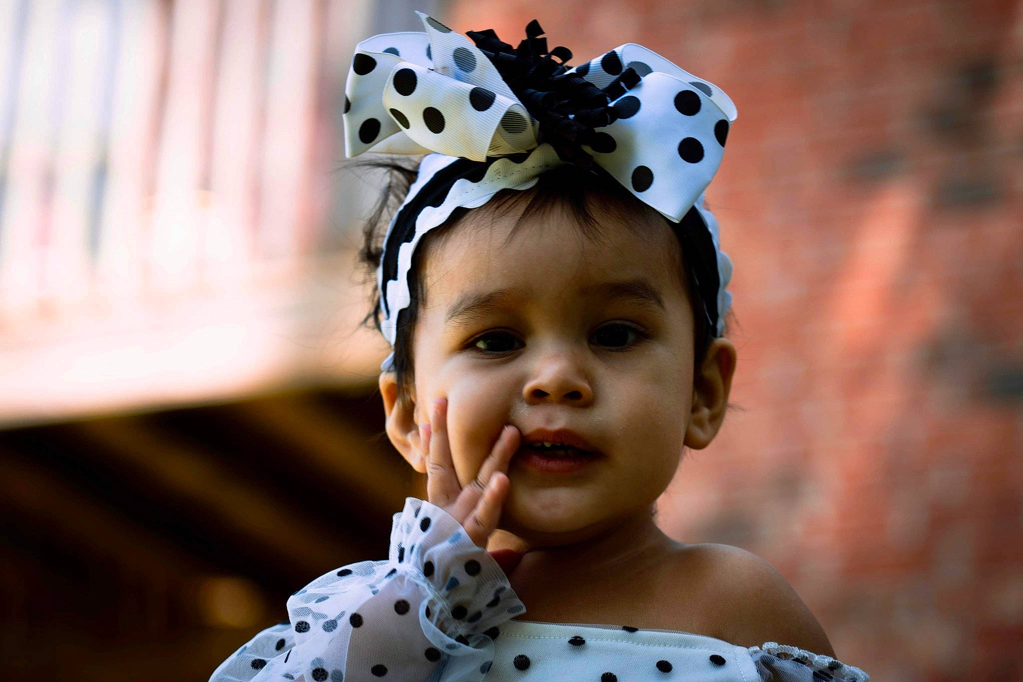 Laila is registered to the contest to win money with this photo: baby, baby_toddler_clothing, child, eyelash, fashion_accessory, flash_photography, fun, hair_accessory, happy, head, headgear, headpiece, leisure, pattern, people_in_nature, person, portrait_photography, smile, toddler, tradition