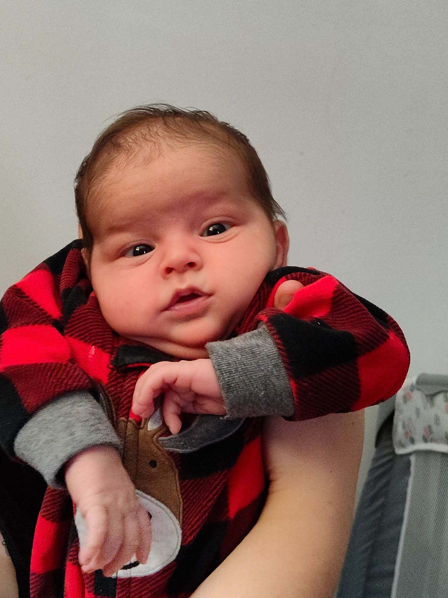 Kordell joined the competition — help win amazing prizes! arm, baby, baby_toddler_clothing, cheek, child, comfort, finger, gesture, happy, human_body, iris, lip, neck, pattern, person, personal_protective_equipment, plaid, sitting, skin, sleeve
