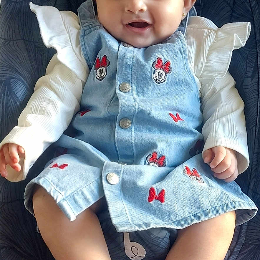 Maëva a rejoint le concours — aidez-le/la à gagner de superbes lots ! accessories, baby, clothing, coat, cushion, face, footwear, furniture, head, homedecor, jacket, jeans, pants, person, photography, portrait, shoe, shorts, sitting, sunglasses