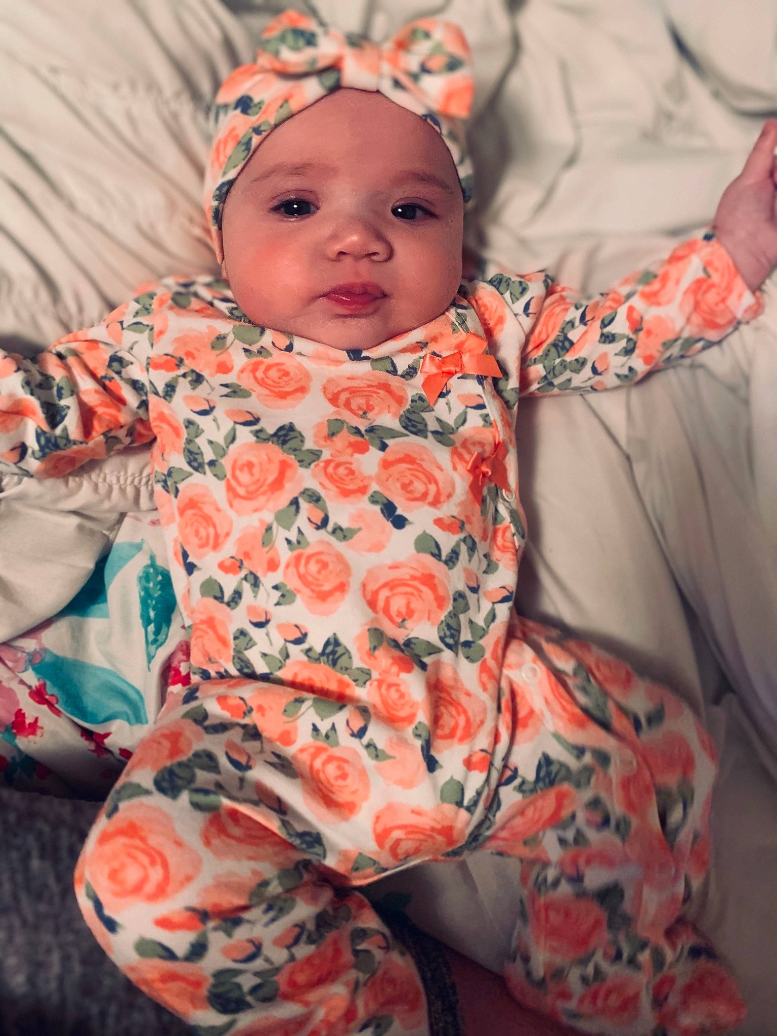 Hermione joined the competition — help win amazing prizes! baby, baby_toddler_clothing, cheek, chin, comfort, dress, eye, face, head, headwear, human_body, iris, lip, nose, orange, outerwear, person, pink, plant, skin