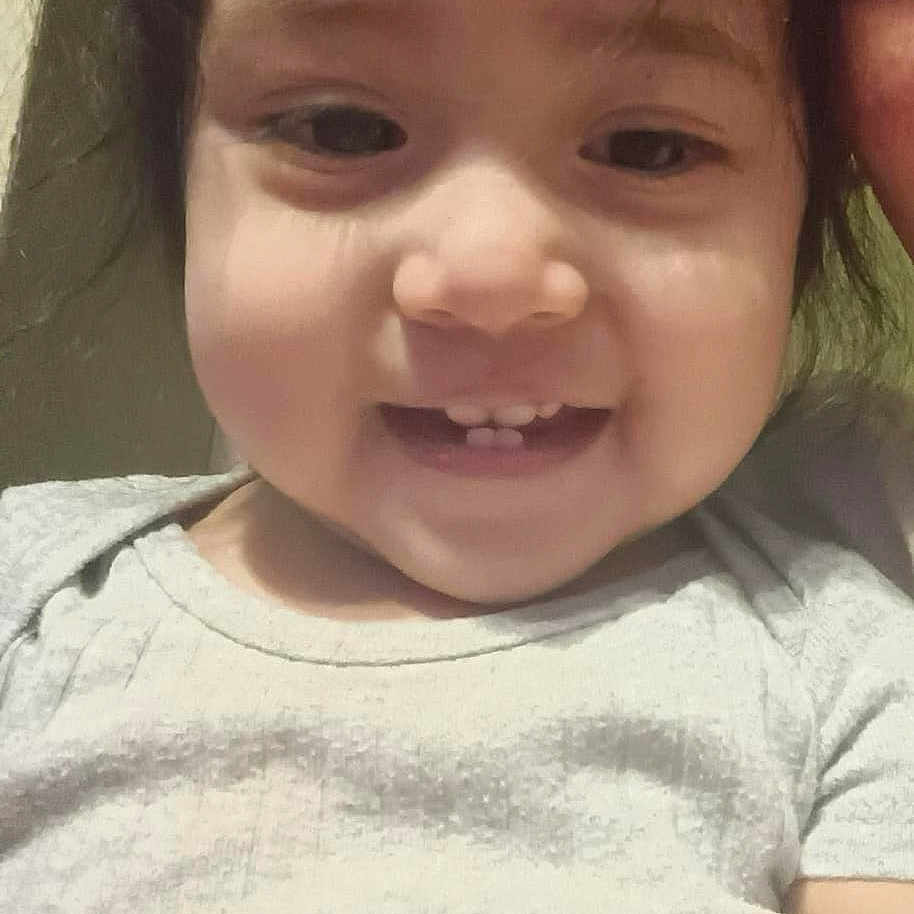 Alisson Abril joined the competition — help win amazing prizes! adult_partial, baby_teeth, bangs, casual_clothing, cheeks, child, close_up, cute, eyes, face, hair, happy, indoor, person, portrait, selfie, short_sleeve_shirt, skin, smiling, toddler