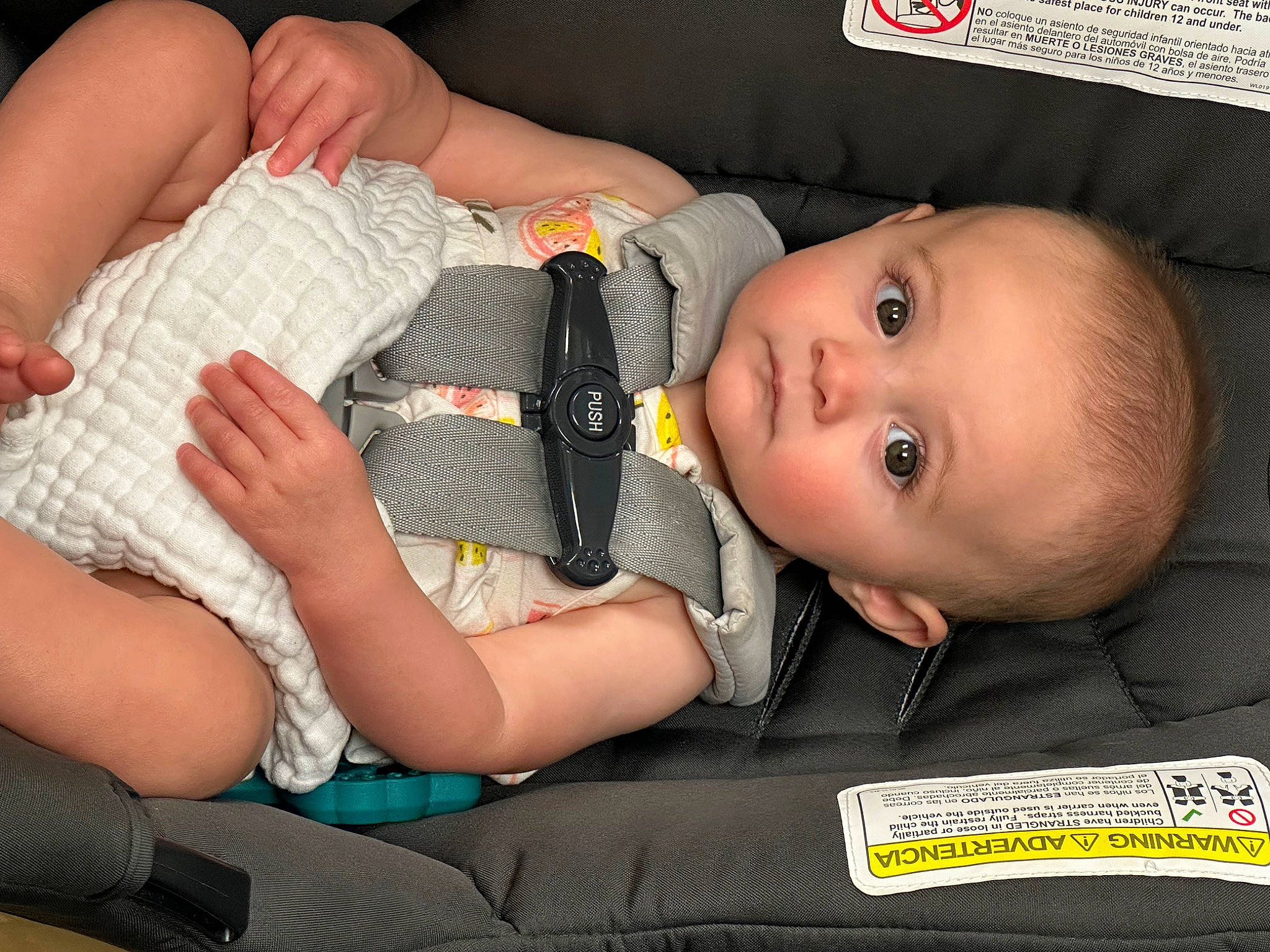 Taylor is registered to the contest to win money with this photo: arm, baby, baby_products, baby_safety, baby_toddler_clothing, cheek, child, comfort, eye, finger, gesture, hand, human_leg, lap, mouth, nail, person, skin, thigh, thumb