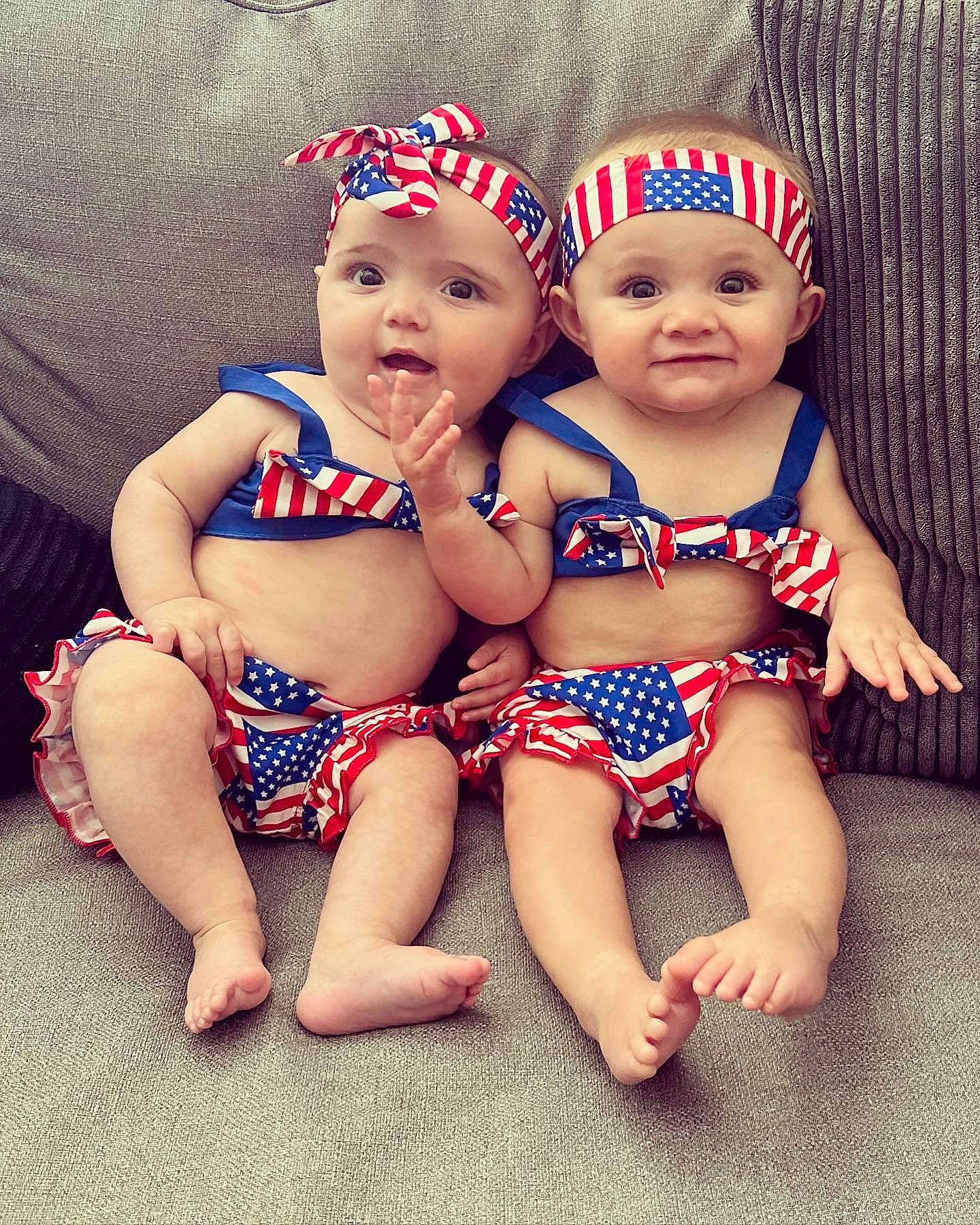 Taylor is registered to the contest to win money with this photo: baby, baby_toddler_clothing, cap, child, electric_blue, event, facial_expression, fashion_accessory, finger, foot, fun, happy, hat, headgear, headwear, human_leg, joy, pattern, person, skin