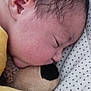 baby, newborn, sleeping, blanket, teddy_bear, yellow_blanket, face, head, closeup, soft_toy, infant, peaceful, cozy, indoor, cute, child, resting, polka_dot, skin, hair