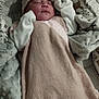 baby, newborn, sleeping, blanket, hat, baby_nest, cushion, fabric, soft, cozy, infant, rest, cute, child, bed, portrait, warm, comfort, indoors, peaceful