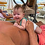Alba participe au concours pour gagner de l'argent avec cette photo : baby, adult, beach, umbrella, smiling, sunny, stroller, person, relaxing, sand, vacation, outdoor, family, summer, happy, clothing, hand, toddler, portrait, sunshade