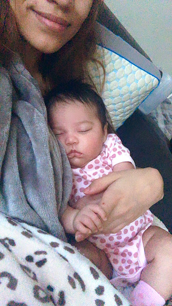 Abriella is registered to the contest to win money with this photo: baby, baby_products, baby_toddler_clothing, cheek, child, comfort, linens, love, nap, person, shoe, skin, sock, toddler