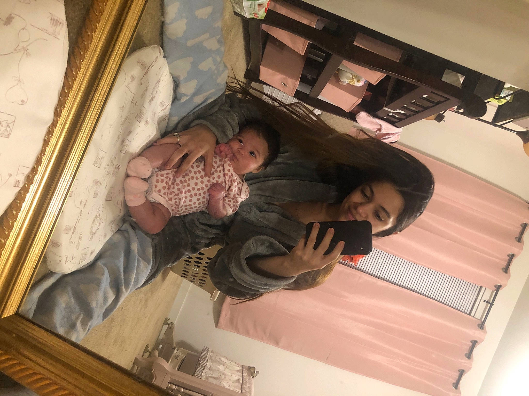 Abriella is registered to the contest to win money with this photo: baby, black_hair, comfort, joy, love, person