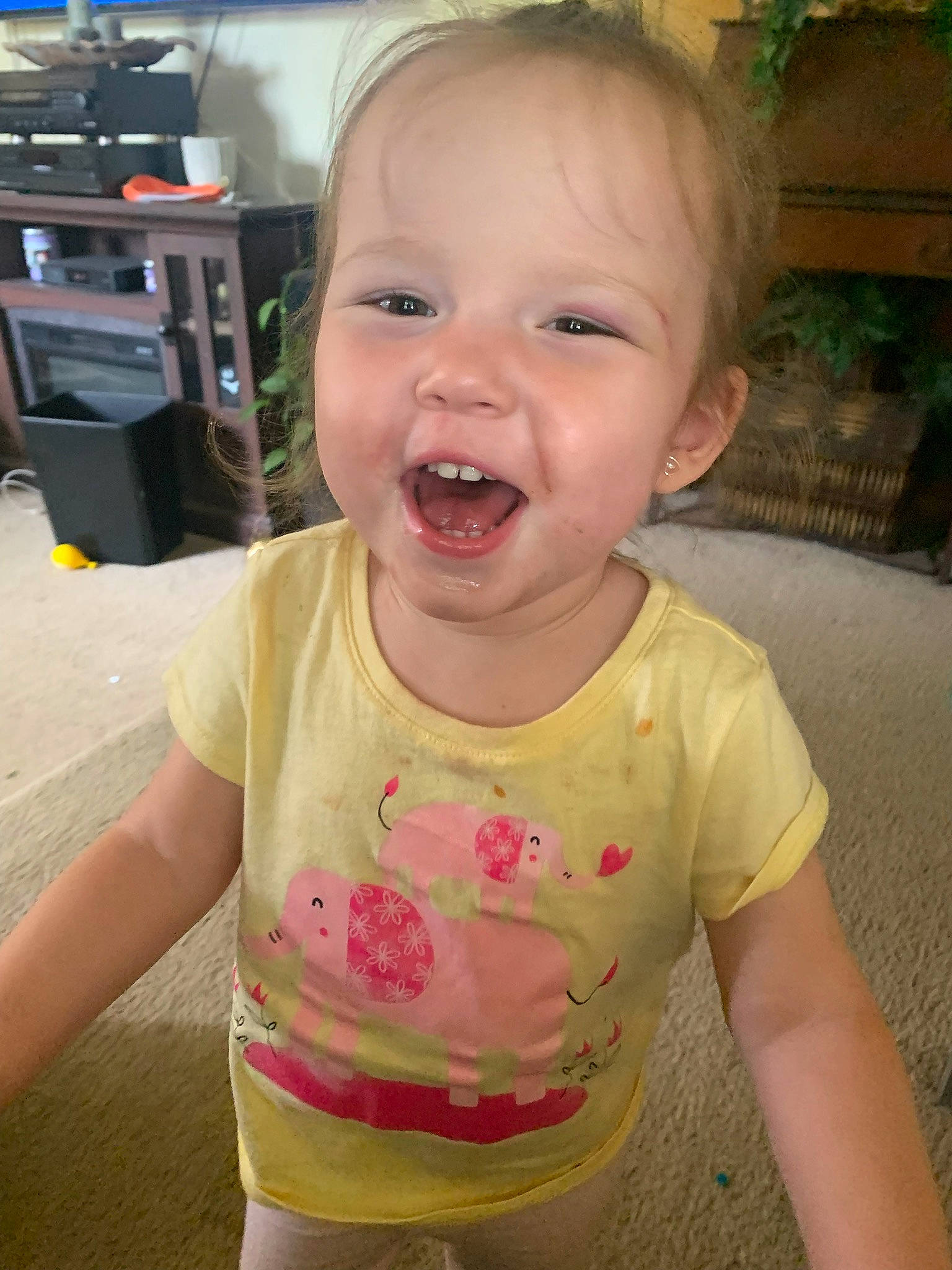 Aurora is registered to the contest to win money with this photo: baby, baby_toddler_clothing, cheek, cool, eyebrow, facial_expression, finger, happy, head, iris, lip, mouth, neck, nose, person, pink, skin, sleeve, smile, toddler