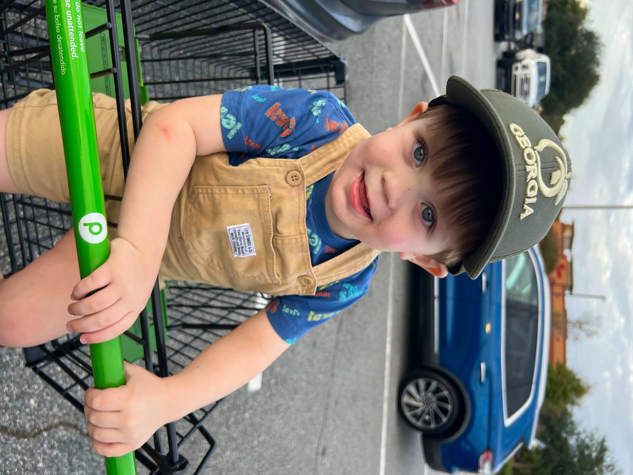 Grayson joined the competition — help win amazing prizes! auto_part, automotive_design, automotive_exterior, automotive_wheel_system, car, child, electric_blue, fun, joy, motor_vehicle, outdoor_play_equipment, person, recreation, smile, snapshot, t_shirt, tire, toddler, tree, vehicle