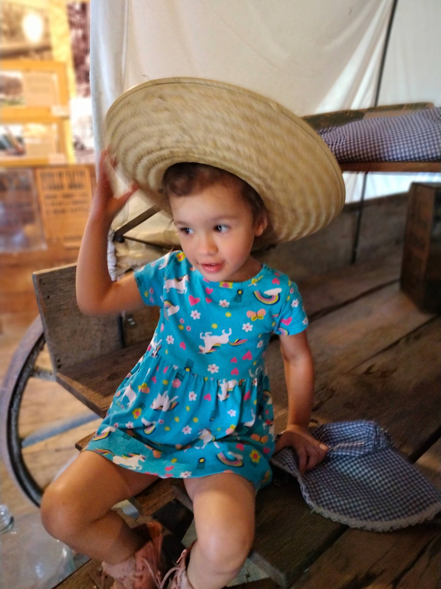 Lillianna joined the competition — help win amazing prizes! baby, baby_toddler_clothing, child, electric_blue, fashion_accessory, flip_flops, fun, happy, hat, headgear, human_leg, leisure, pattern, person, sandal, sitting, skin, slipper, sun_hat, thigh