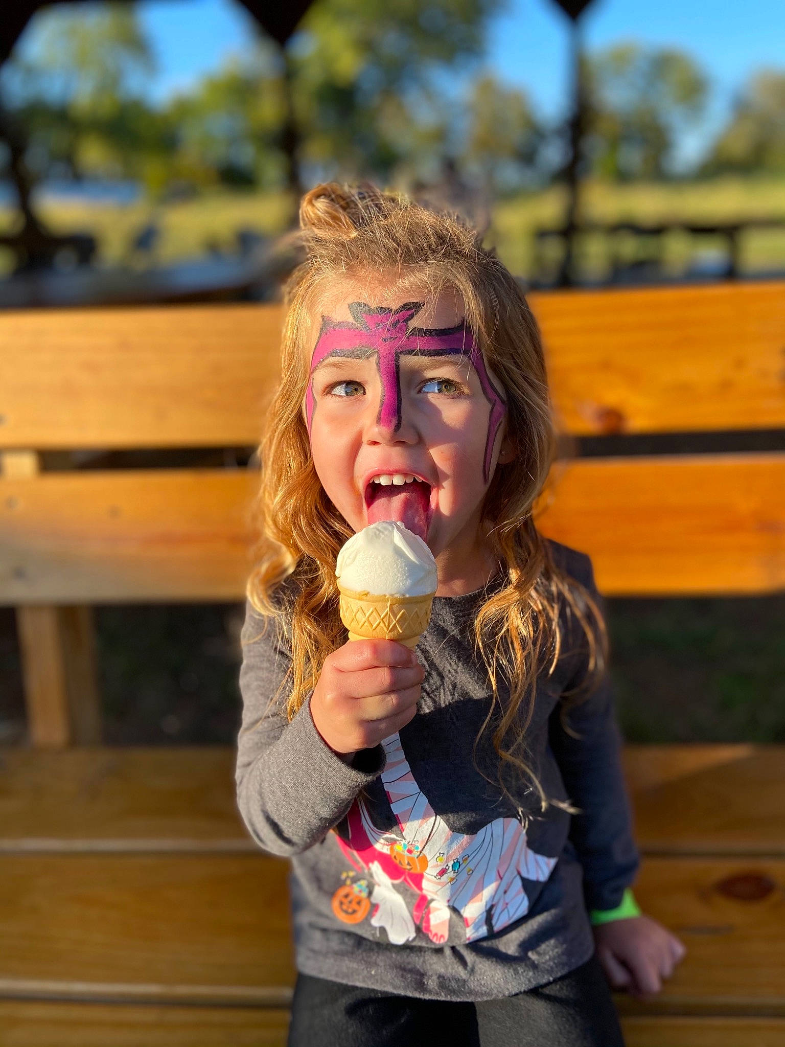 Hadlie is registered to the contest to win money with this photo: child, food, happy, ice_cream_cone, person, smile, vacation, yellow