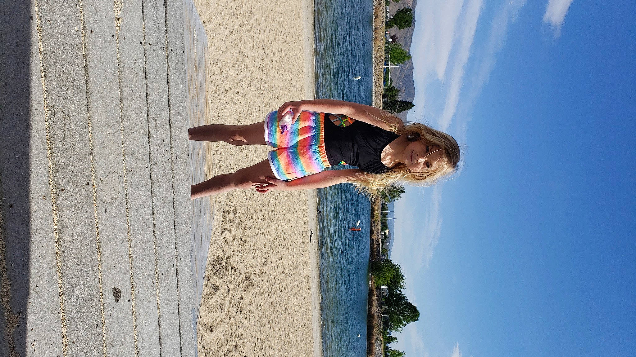 Skarlett is registered to the contest to win money with this photo: azure, beach, cloud, electric_blue, fun, happy, human_leg, joy, leisure, people_in_nature, person, plant, recreation, shadow, sky, smile, thigh, tree, vacation, white