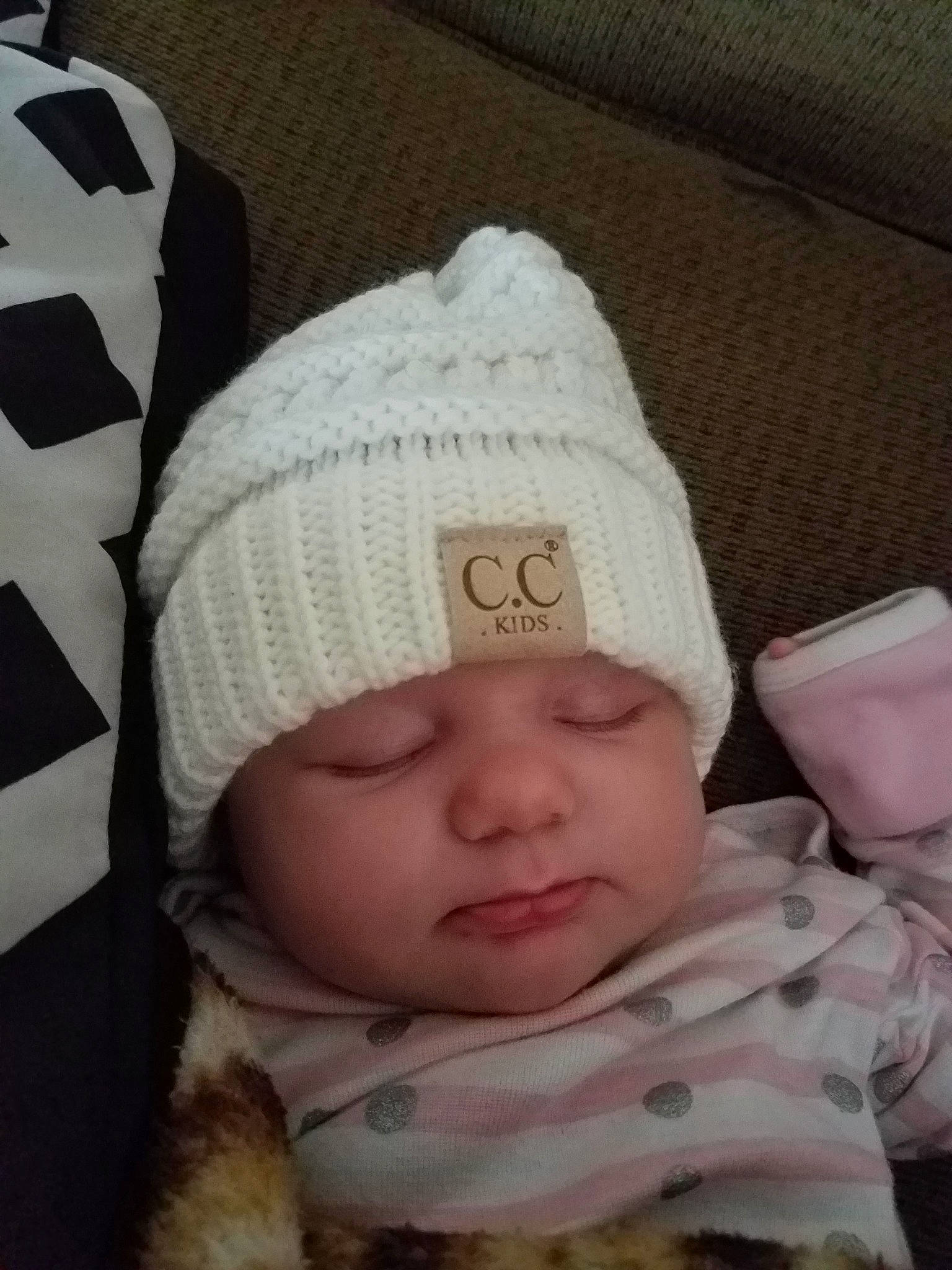 Jasmine Faye is registered to the contest to win money with this photo: baby, baby_sleeping, beanie, bonnet, cap, cheek, child, crochet, headgear, headwear, knit_cap, knitting, person, toddler, wool