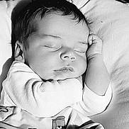 Michael is registered to the contest to win money with this photo: baby, sleeping, blanket, cartoon, child, infant, face, hand, peaceful, cozy, monochrome, portrait, rest, soft, cute, clothing, indoors, closeup, toddler, nap