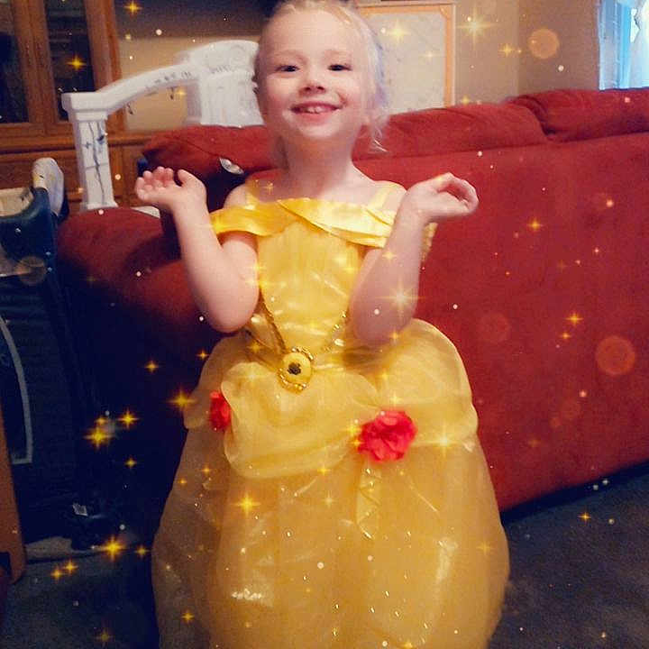 Brooklyn is registered to the contest to win money with this photo: architecture, building, child, clothing, costume, couch, cushion, dress, face, female, furniture, girl, head, homedecor, indoors, livingroom, person, photography, portrait, room