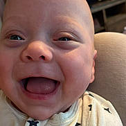 Junior joined the competition — help win amazing prizes! baby, smiling, face, infant, closeup, happy, expression, indoor, television, clothing, stars, person, cute, head, young, joy, child, apparel, portrait, light