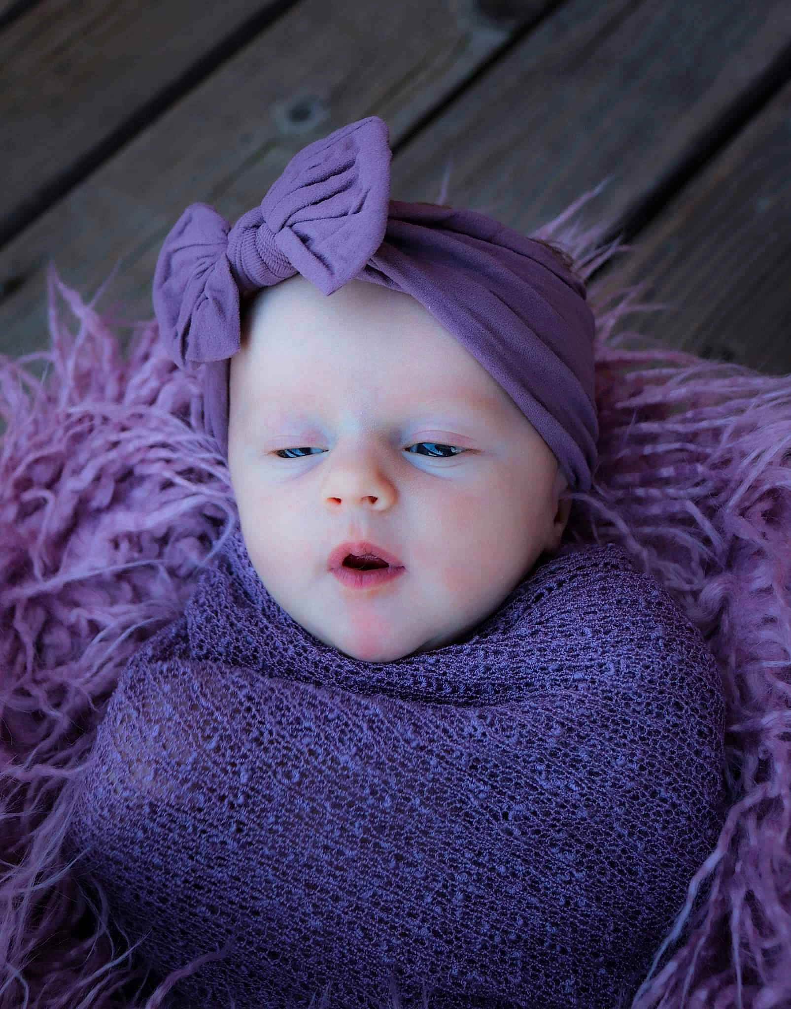 Nylah is registered to the contest to win money with this photo: baby, baby_toddler_clothing, cap, cheek, clothing, creative_arts, eye, face, head, headgear, lip, outerwear, person, pink, purple, skin, sleeve, textile, toddler, violet