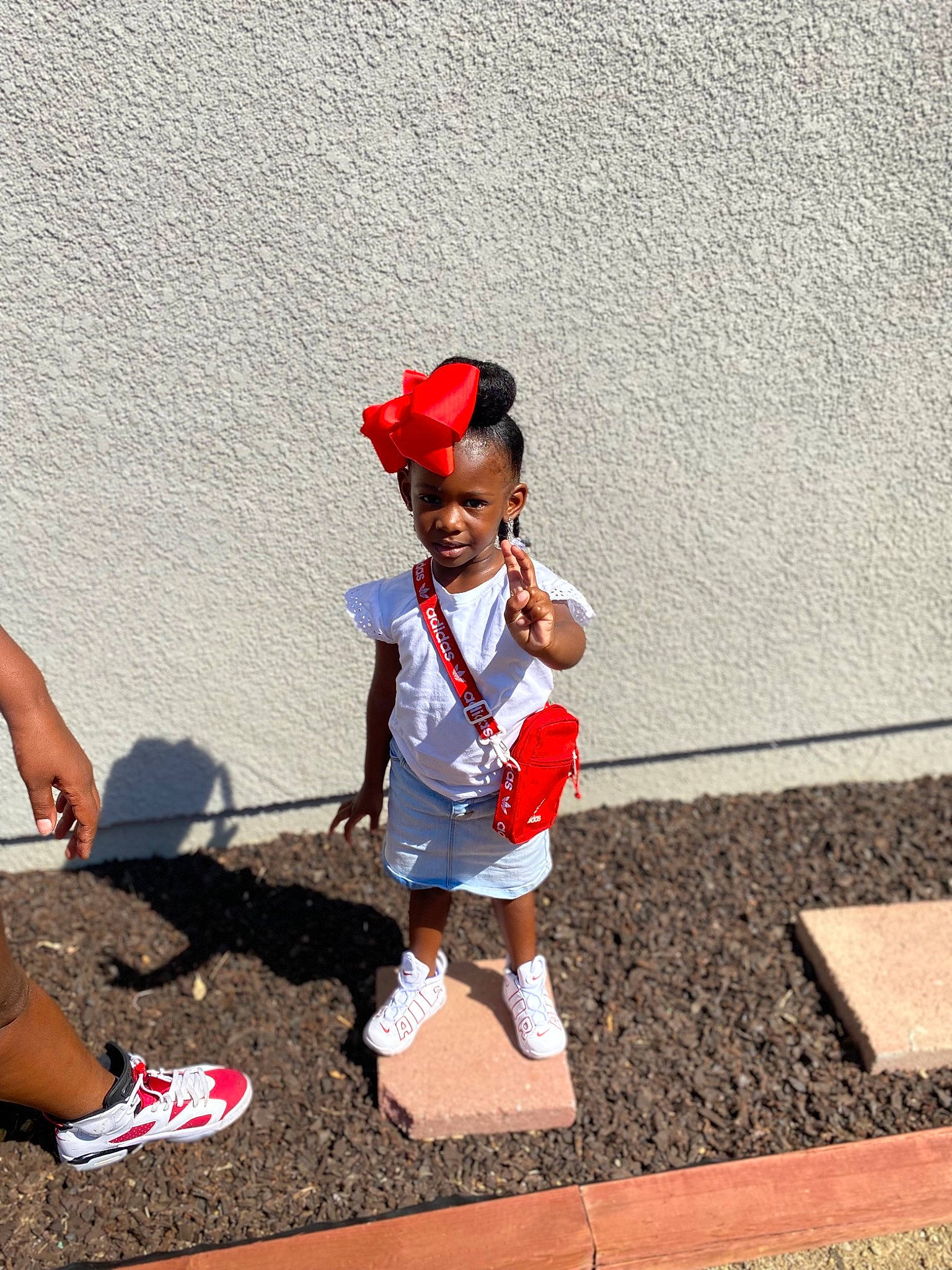 Kalayah is registered to the contest to win money with this photo: child, electric_blue, flooring, fun, happy, hat, human_leg, leisure, person, play, recreation, running, shadow, shorts, smile, sneakers, sports, thigh, toddler, uniform