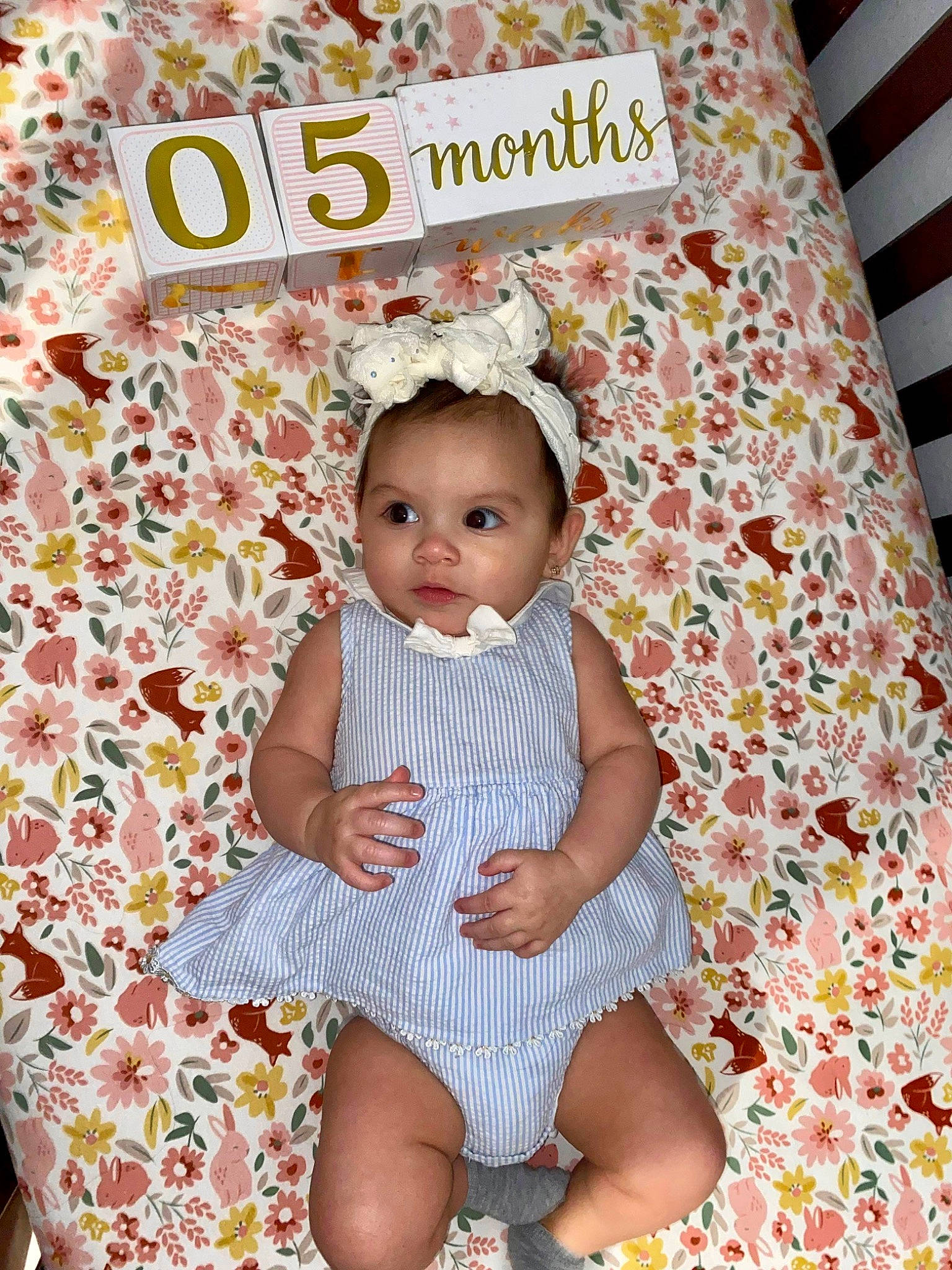 Brenda joined the competition — help win amazing prizes! baby, baby_toddler_clothing, beauty, child, design, face, foot, happy, human_leg, linens, magenta, pattern, person, pink, product, room, sitting, sleeve, textile, thigh