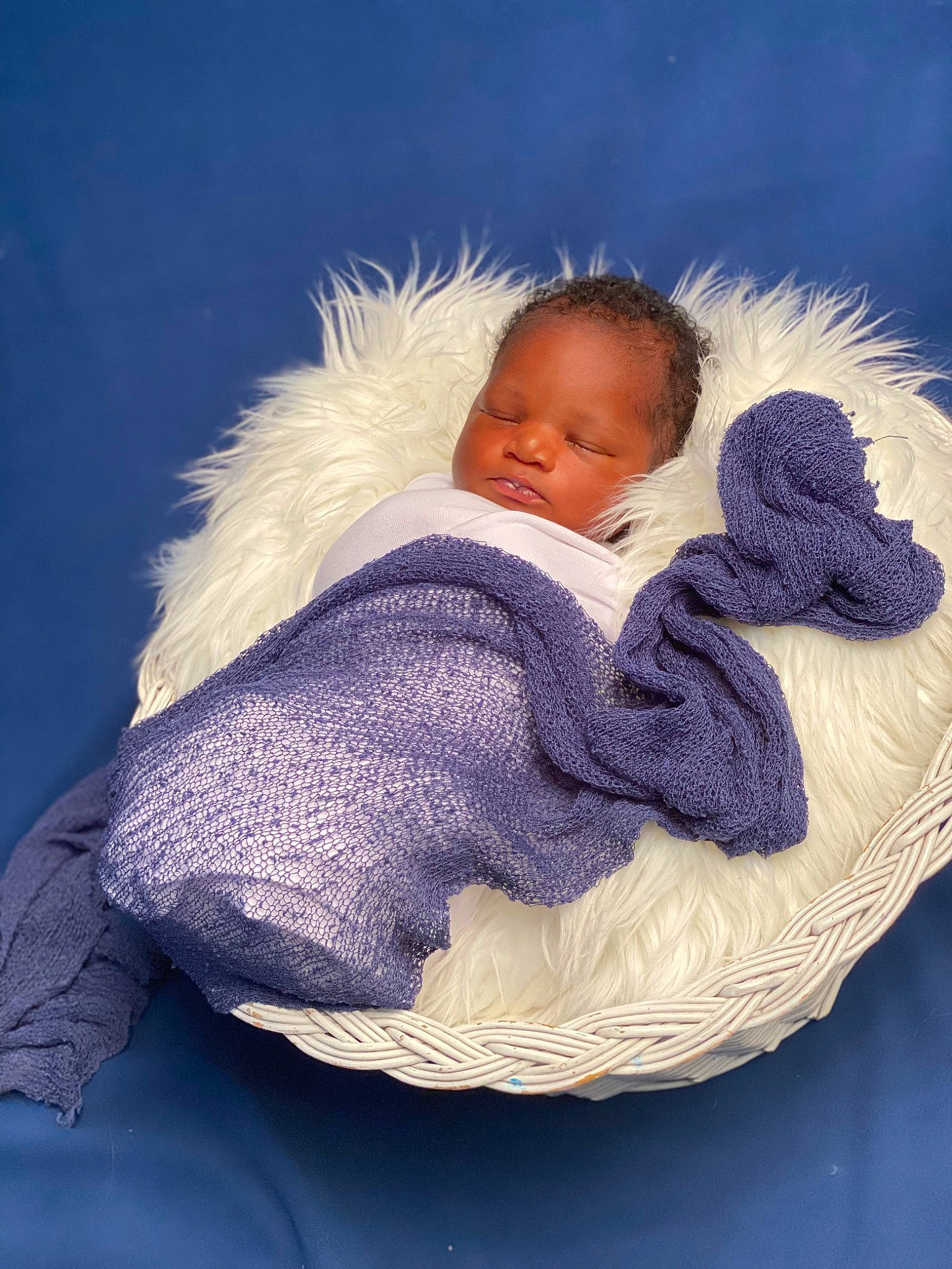 Francis participe au concours pour gagner de l'argent avec cette photo : baby, baby_products, baby_sleeping, baby_toddler_clothing, bedtime, child, comfort, electric_blue, fur, headgear, linens, nap, outerwear, person, room, sitting, sleeve, toddler, winter, wool