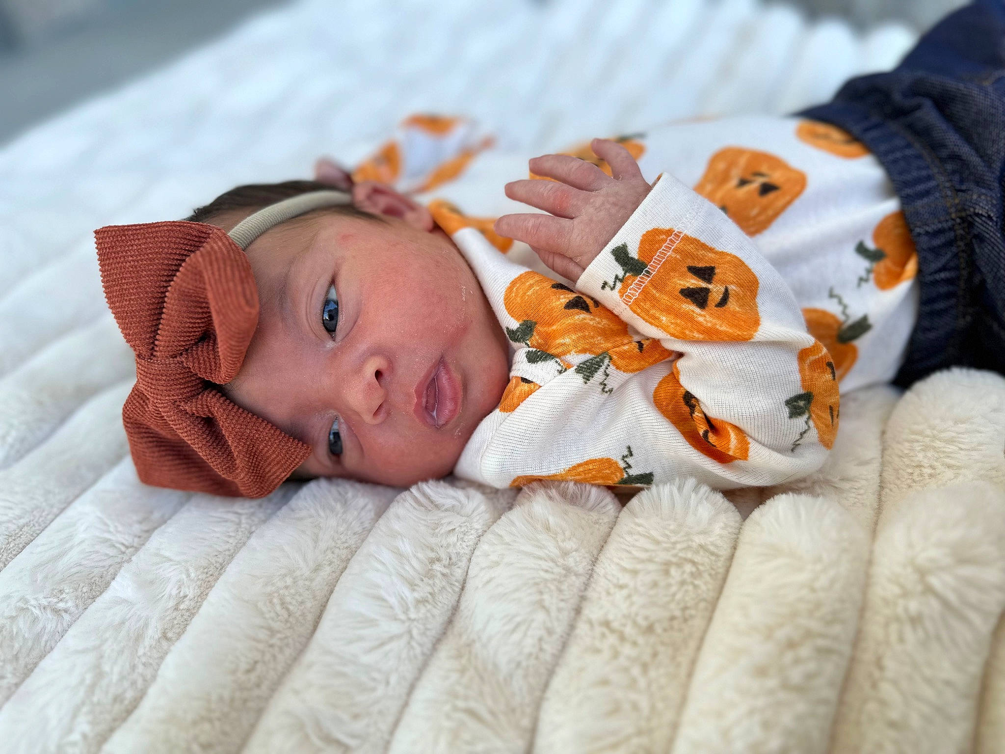 Hadlee joined the competition — help win amazing prizes! baby, baby_toddler_clothing, bed_sheet, bedding, bedtime, blanket, child, comfort, headwear, linens, nap, orange, pattern, person, room, skin, sleep, toddler, wood