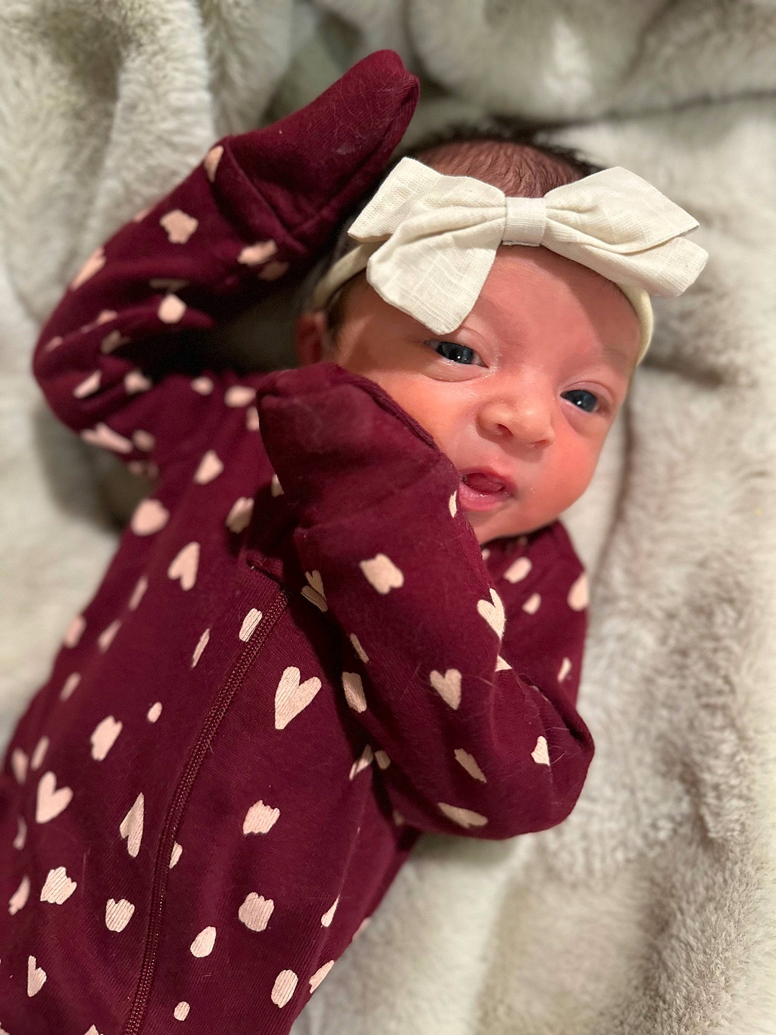 Hadlee is registered to the contest to win money with this photo: baby, baby_products, baby_sleeping, baby_toddler_clothing, cap, carmine, child, collar, comfort, face, fashion_accessory, headwear, linens, magenta, outerwear, pattern, person, pink, skin, sleeve