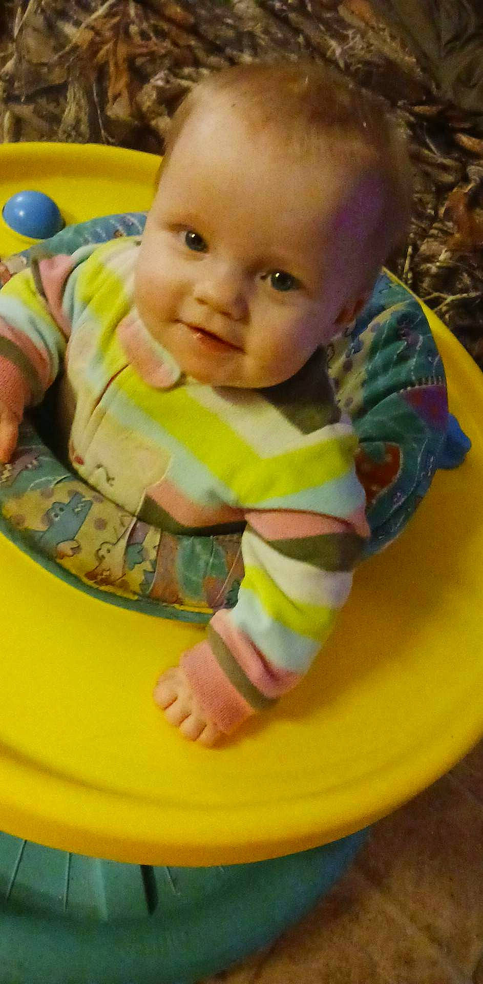 Nellie is registered to the contest to win money with this photo: arm, baby, baby_grabbing_for_something, baby_toddler_clothing, cheek, chin, eye, face, facial_expression, finger, head, human_body, iris, nose, organ, person, photograph, skin, sleeve, toddler