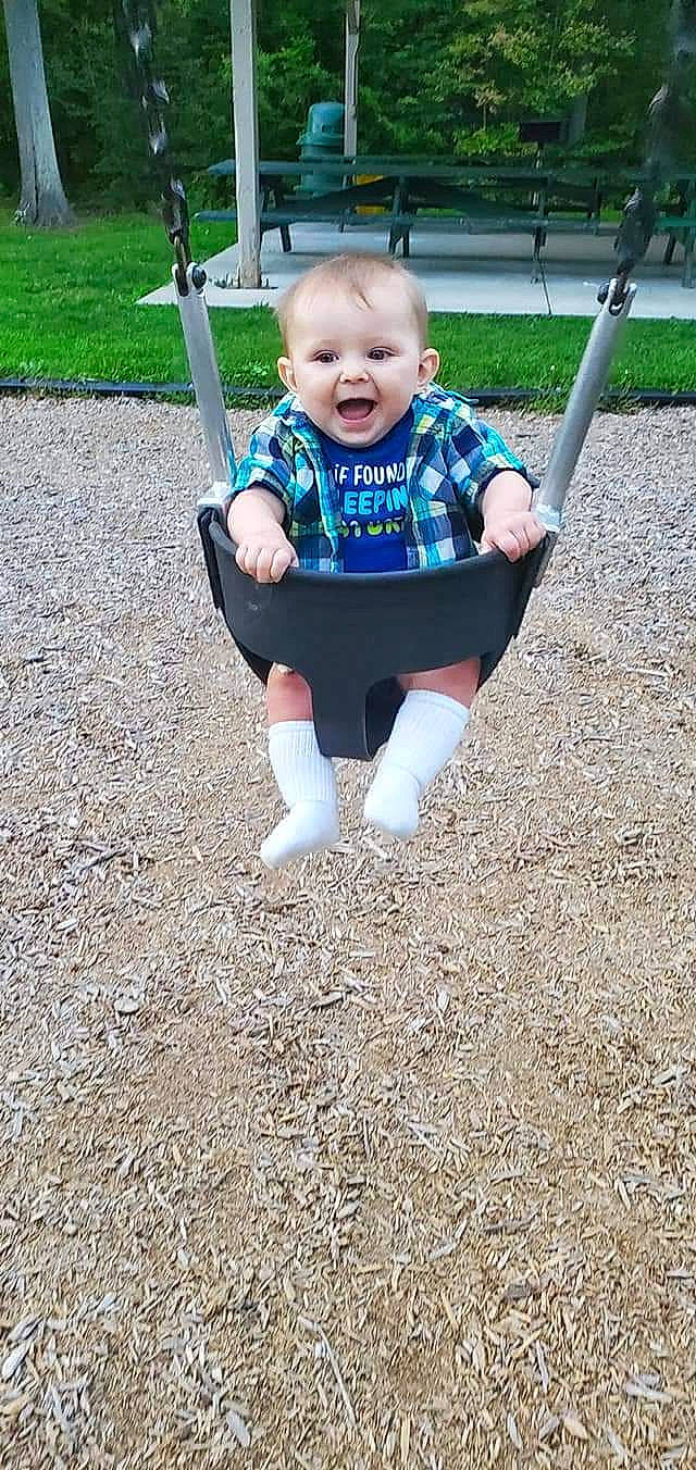 Luka joined the competition — help win amazing prizes! baby, baby_toddler_clothing, child, city, electric_blue, eye, fun, grass, happy, leisure, outdoor_play_equipment, people_in_nature, person, playground, recreation, sleeve, smile, soil, swing, t_shirt