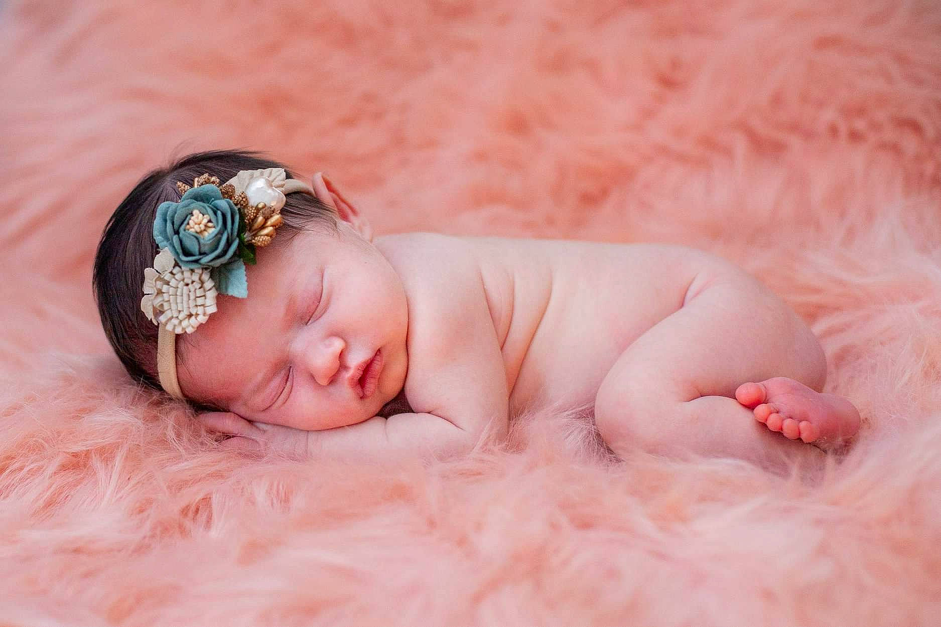 Audrey is registered to the contest to win money with this photo: baby, baby_sleeping, birth, child, fashion_accessory, hair_accessory, headband, headgear, headpiece, headwear, person, photograph, photography, pink, portrait_photography, skin, toddler