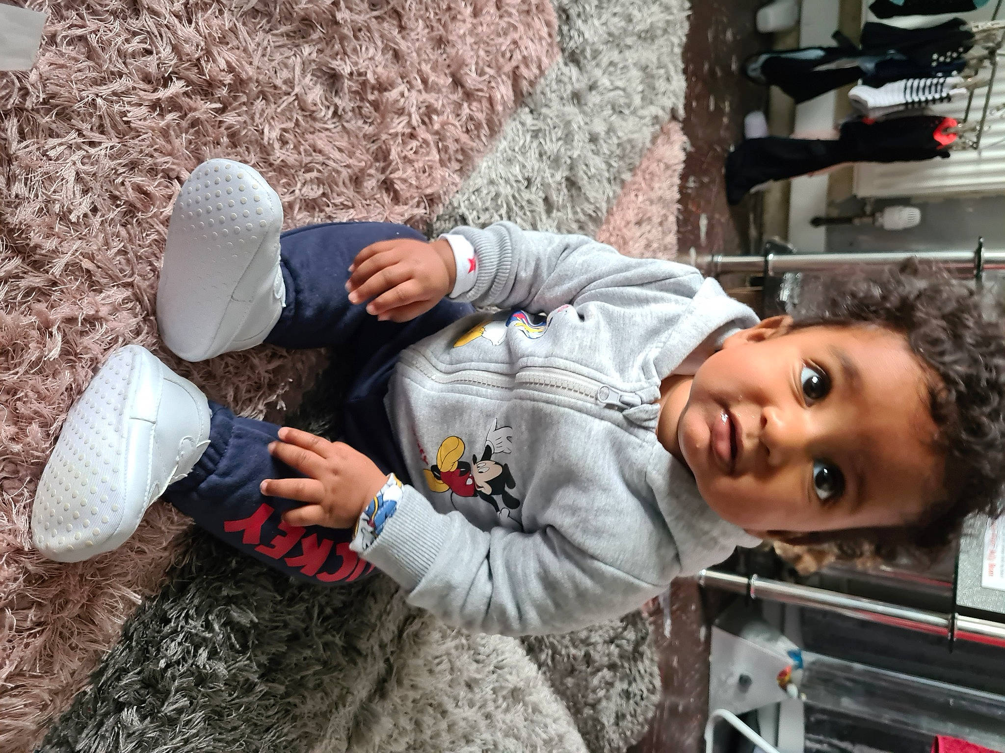 Jamie is registered to the contest to win money with this photo: baby, child, fun, glove, grass, happy, hat, jacket, leisure, person, rock, sitting, soil, street, toddler, tourism, travel, tree, vacation, winter