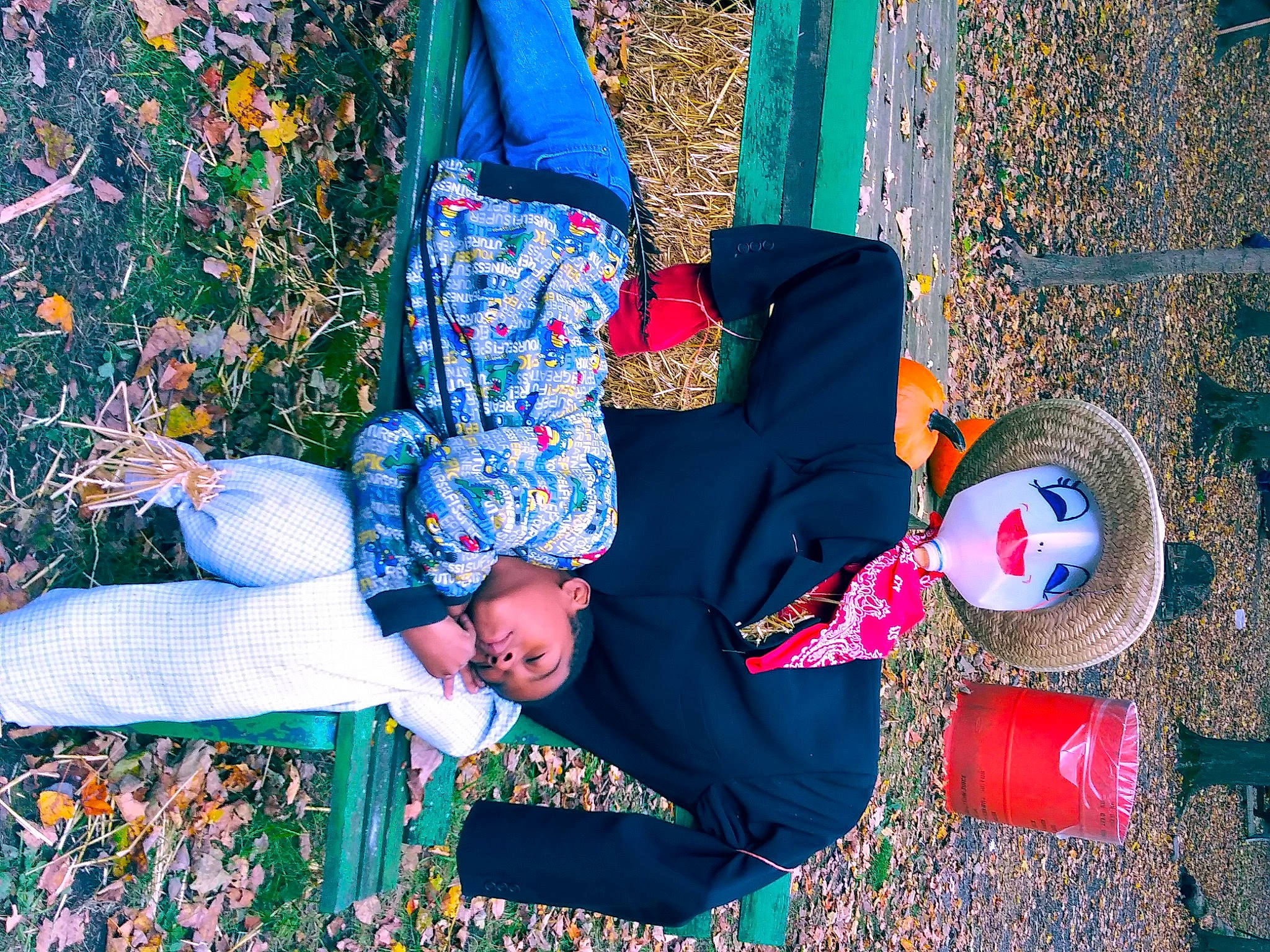 Kenneth is registered to the contest to win money with this photo: child, headwear, leaf, person, plant, sitting, smile, tree