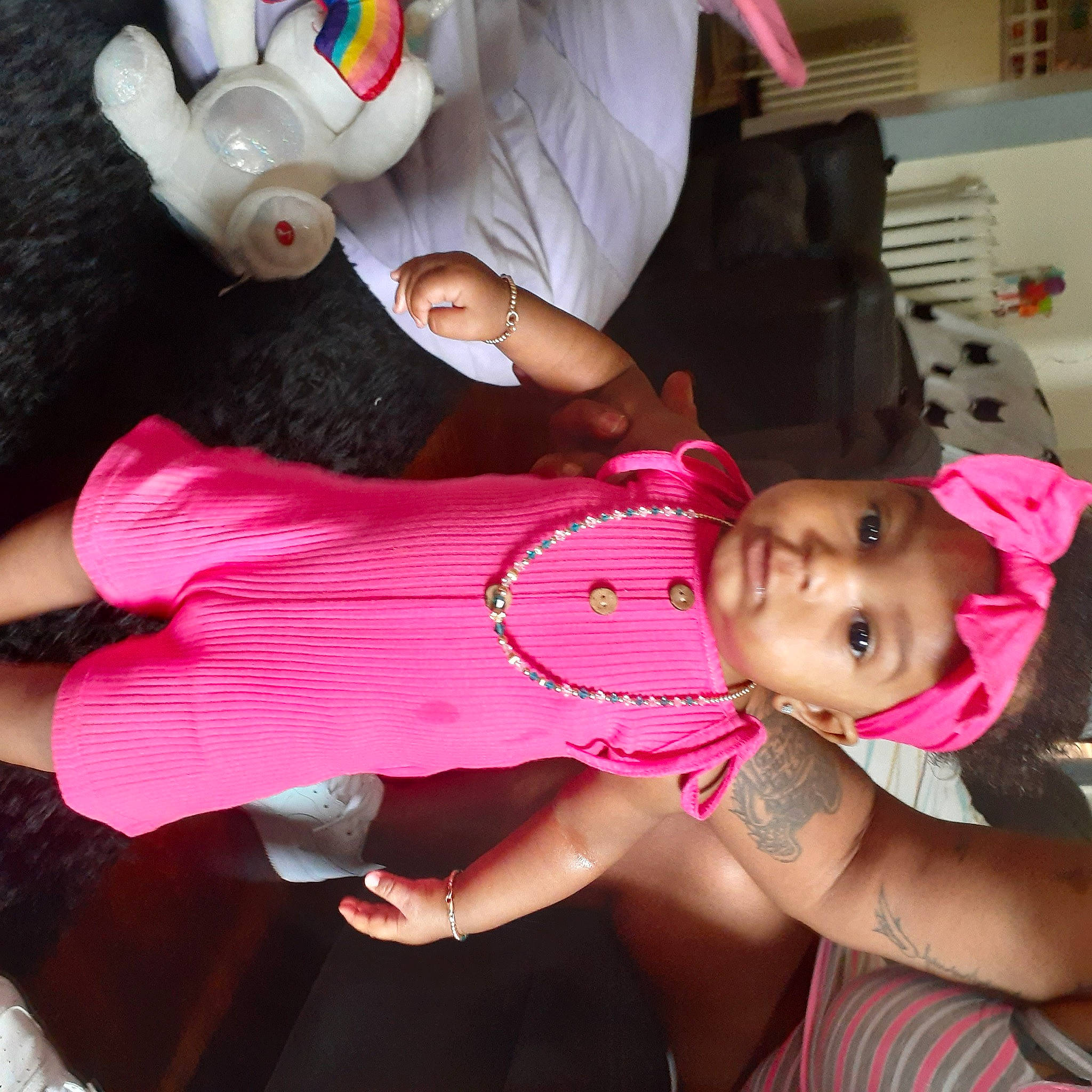 An'Jali is registered to the contest to win money with this photo: arm, child, ear, fun, hand, headwear, leg, person, pink, play, skin, toddler, toy