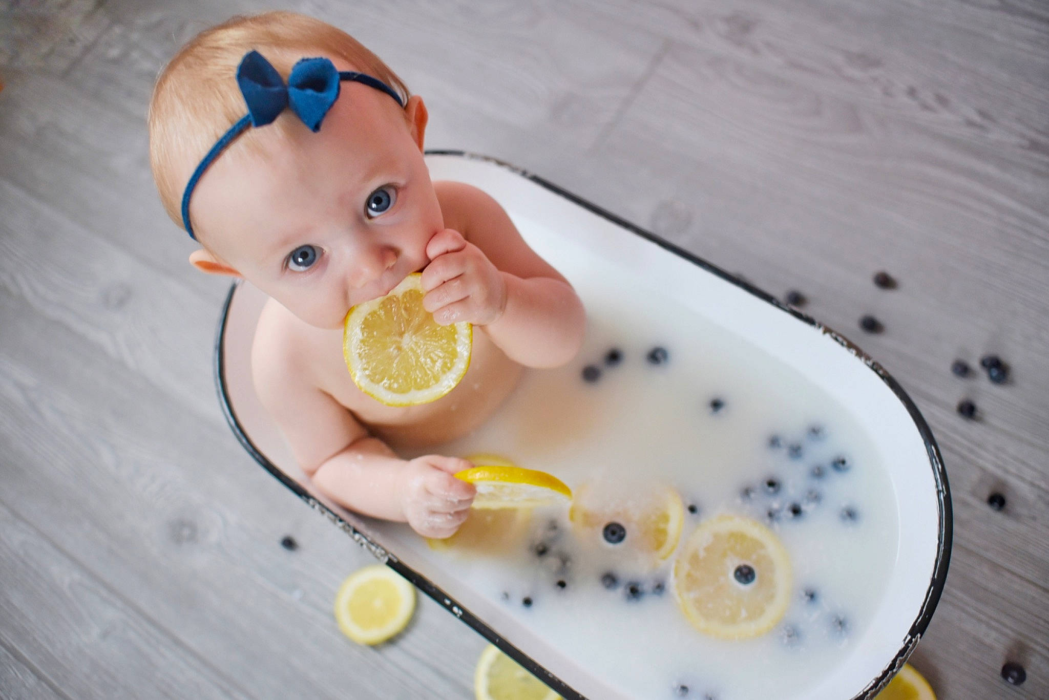 Leyla is registered to the contest to win money with this photo: baby, bathing, child, food, joy, lemon, person, toddler