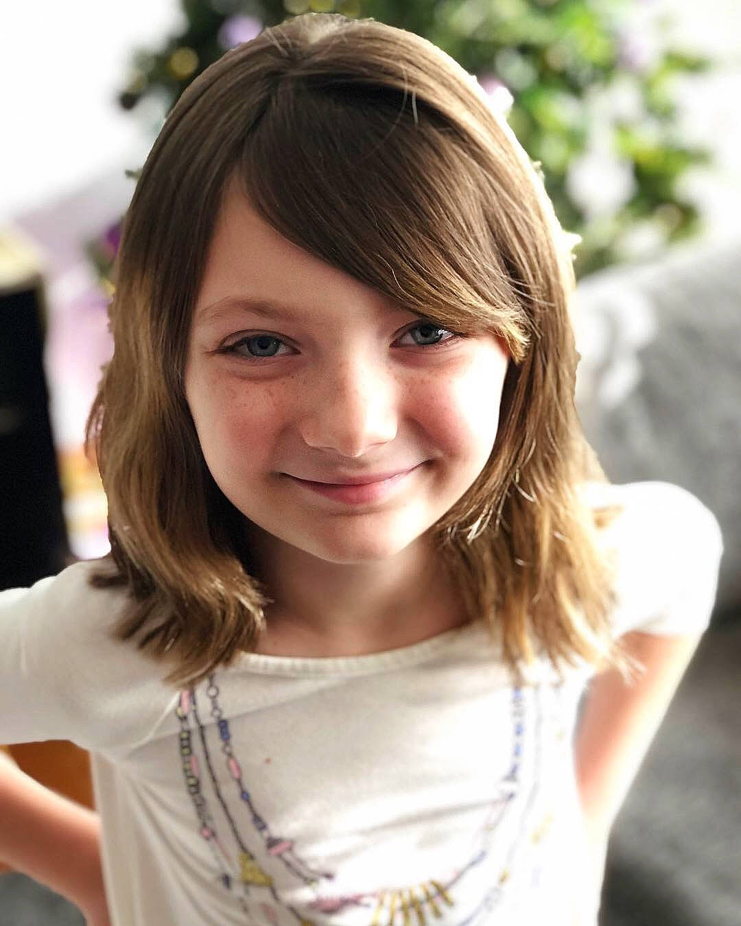 Taryn is registered to the contest to win money with this photo: bangs, beauty, black_hair, blond, bob_cut, brown_hair, child_model, chin, eyebrow, face, feathered_hair, forehead, hair, hair_coloring, hairstyle, joy, layered_hair, long_hair, person, smile