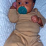 Onaraya is registered to the contest to win money with this photo: baby, blanket, child, comfort, cozy, cute, face, hand, indoors, infant, lying_down, newborn, pacifier, pajamas, relaxed, resting, skin, sleepwear, soft, toddler