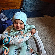 Jiraiya joined the competition — help win amazing prizes! baby, child, smiling, hat, baby_walker, indoor, wooden_wall, cushion, playful, happy, clothing, toy, seat, person, infant, cute, floor, fabric, comfortable, portrait