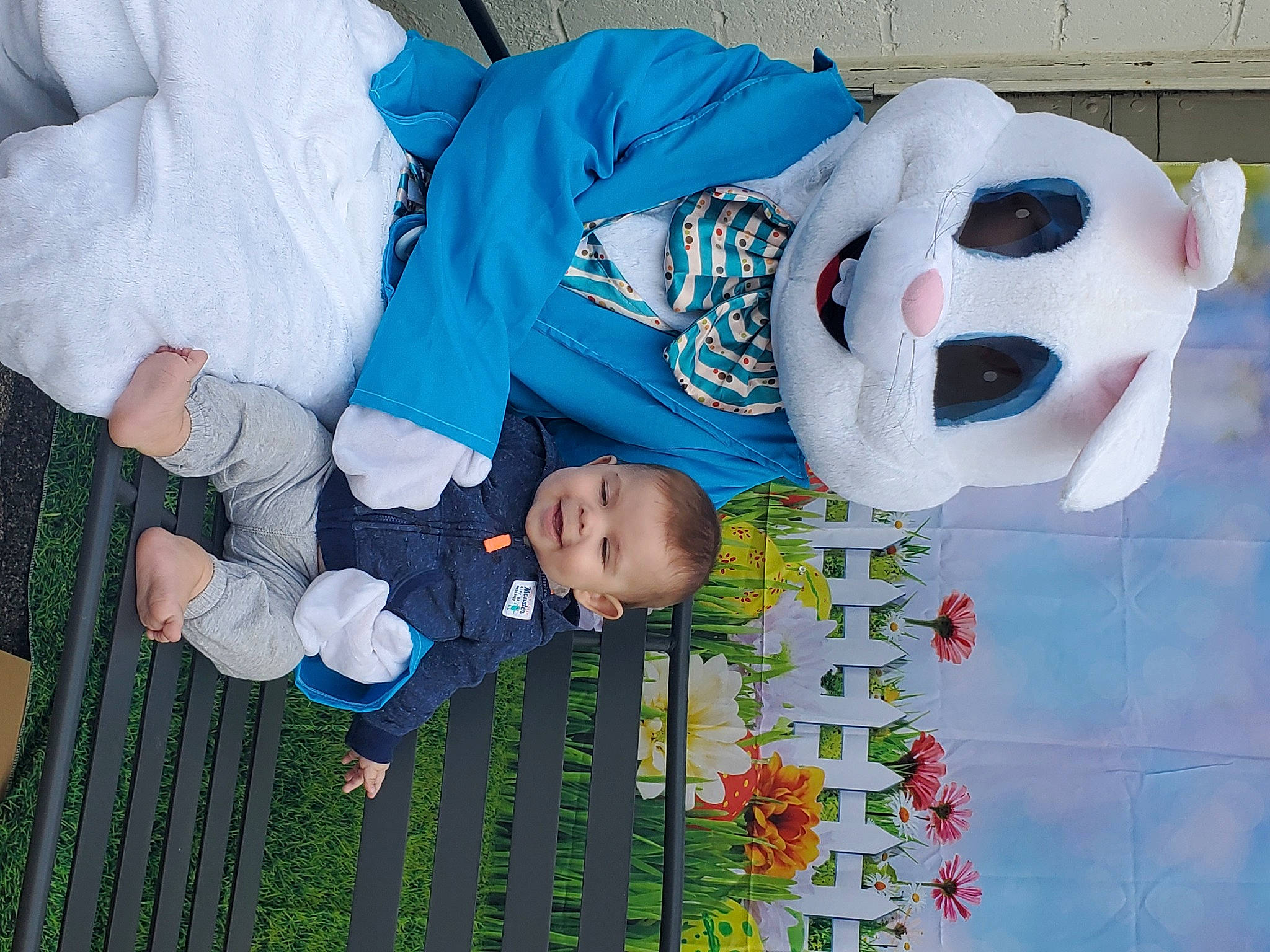 Danny is registered to the contest to win money with this photo: baby, baby_products, baby_toddler_clothing, blue, carmine, child, event, flower, fun, happy, human_body, pattern, person, plant, smile, snowman, textile, toddler, toy, tree