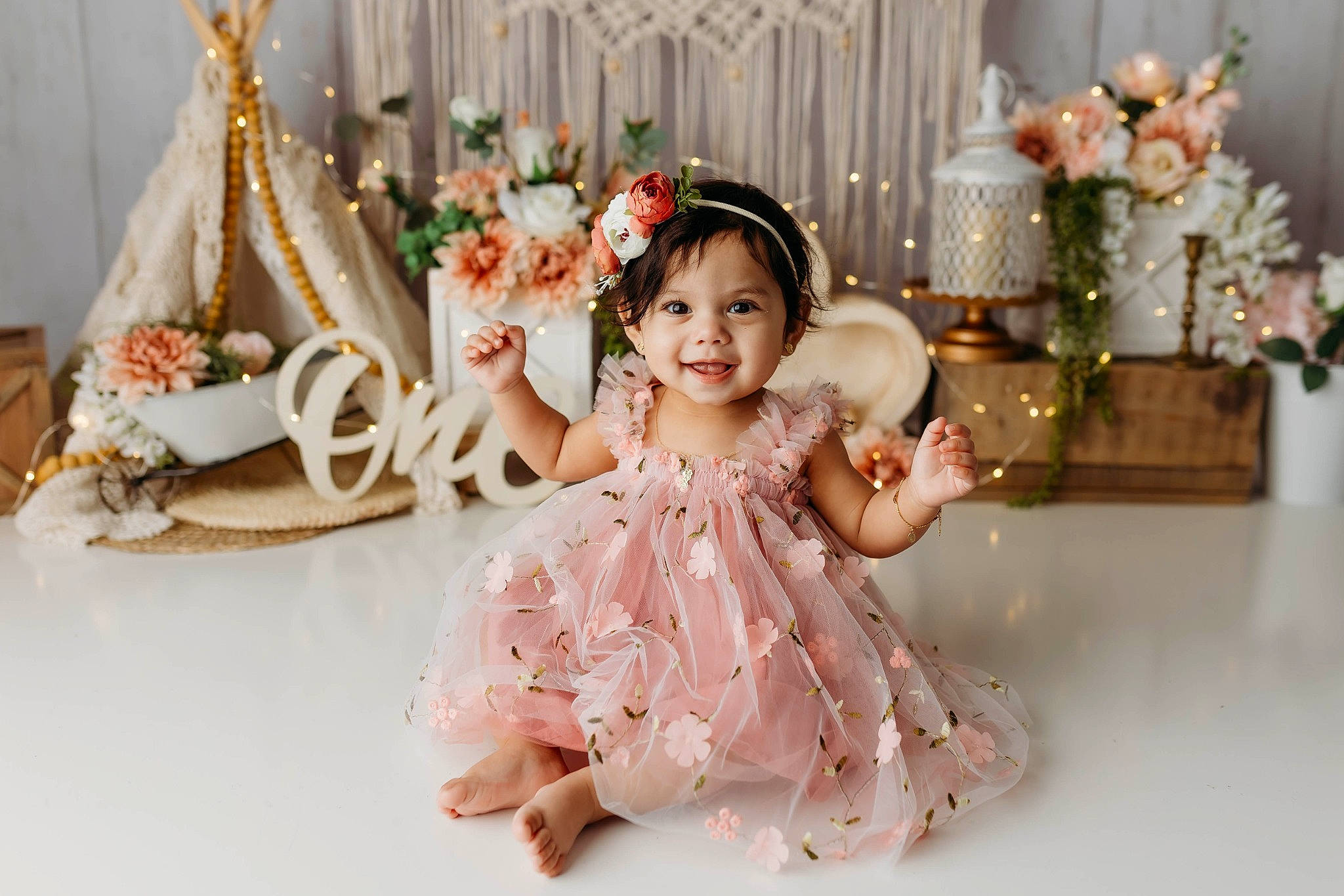 Sofia is registered to the contest to win money with this photo: baby_toddler_clothing, bridal_accessory, child, dress, embellishment, event, hair_accessory, happy, headgear, headpiece, jewellery, joy, peach, person, petal, pink, plant, sleeve, smile, textile