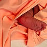 Enid joined the competition — help win amazing prizes! baby, foot, newborn, skin, fabric, soft, peach, closeup, tender, infant, wrapped, texture, folds, warm, cozy, small, human, detail, cute, body_part