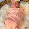 Enid joined the competition — help win amazing prizes! newborn, baby, sleeping, wrapped, blanket, headband, flower, basket, soft, fluffy, peaceful, infant, cute, portrait, closeup, skin, resting, cozy, pink, warm
